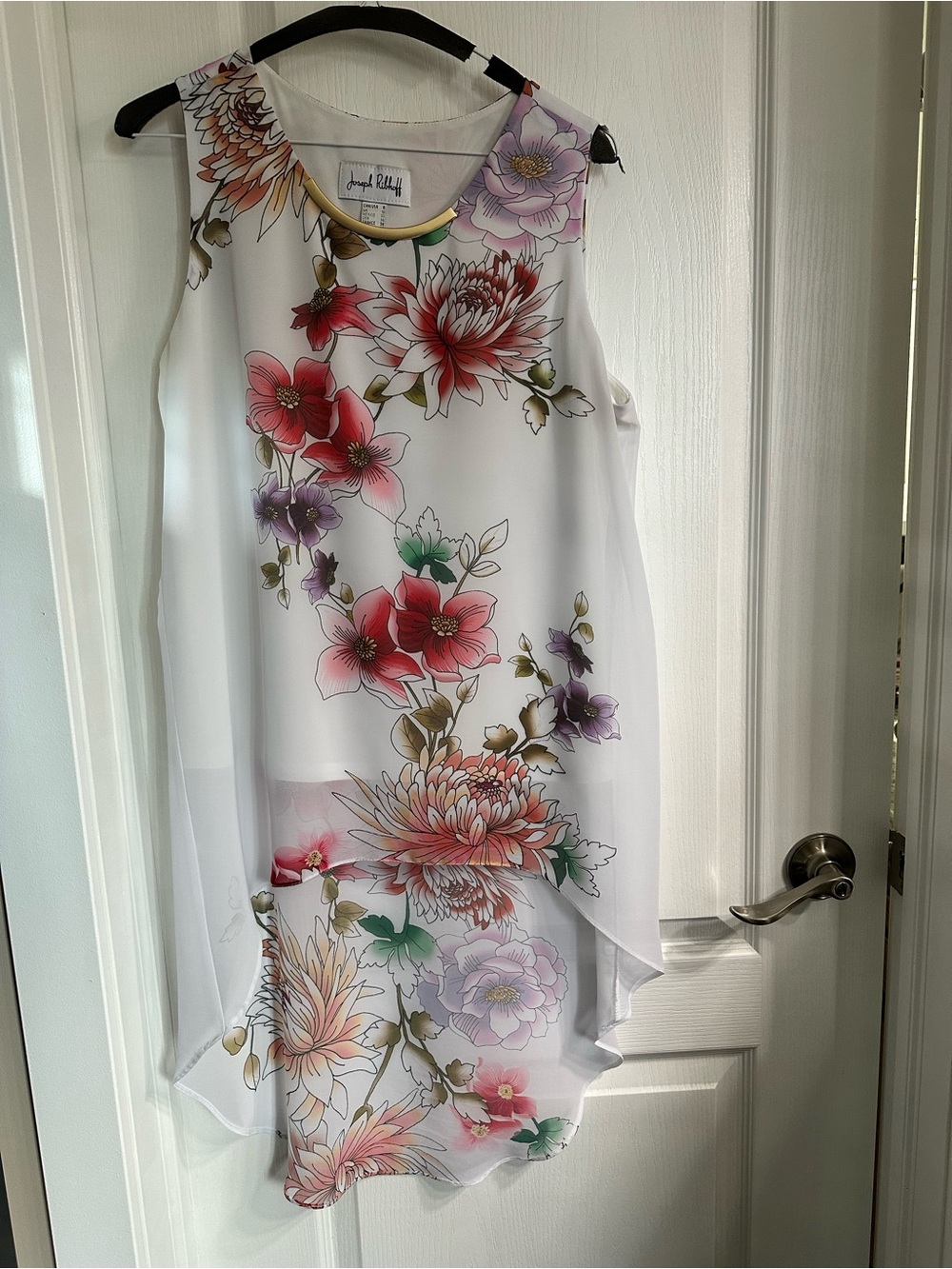Floral sleeveless top with gold neckline